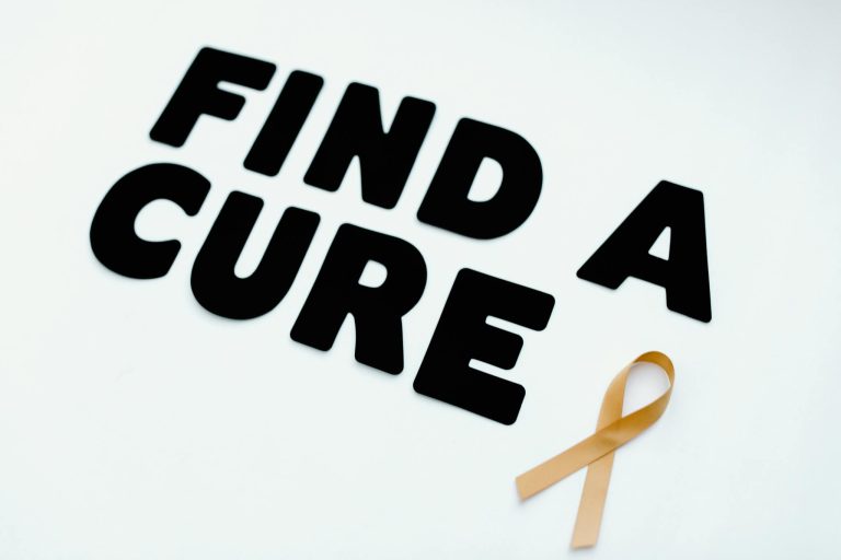 Find Cure Text by Ribbon on White Background